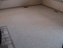 Before and after carpet cleaning showing a clean strip and the white square where furniture stood